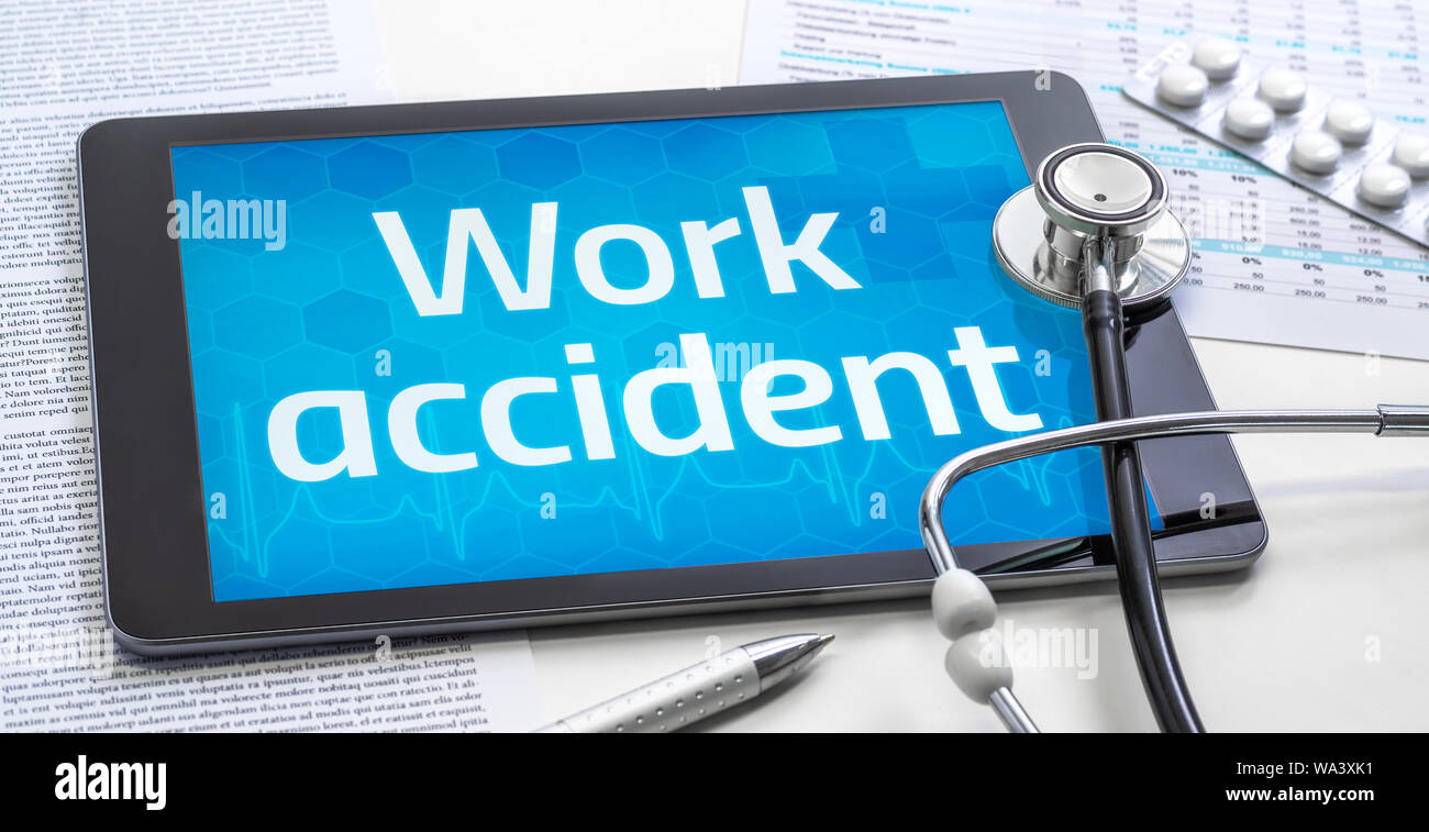 Das Wort Arbeit Unfall auf dem Display eines Tablet Stockfoto