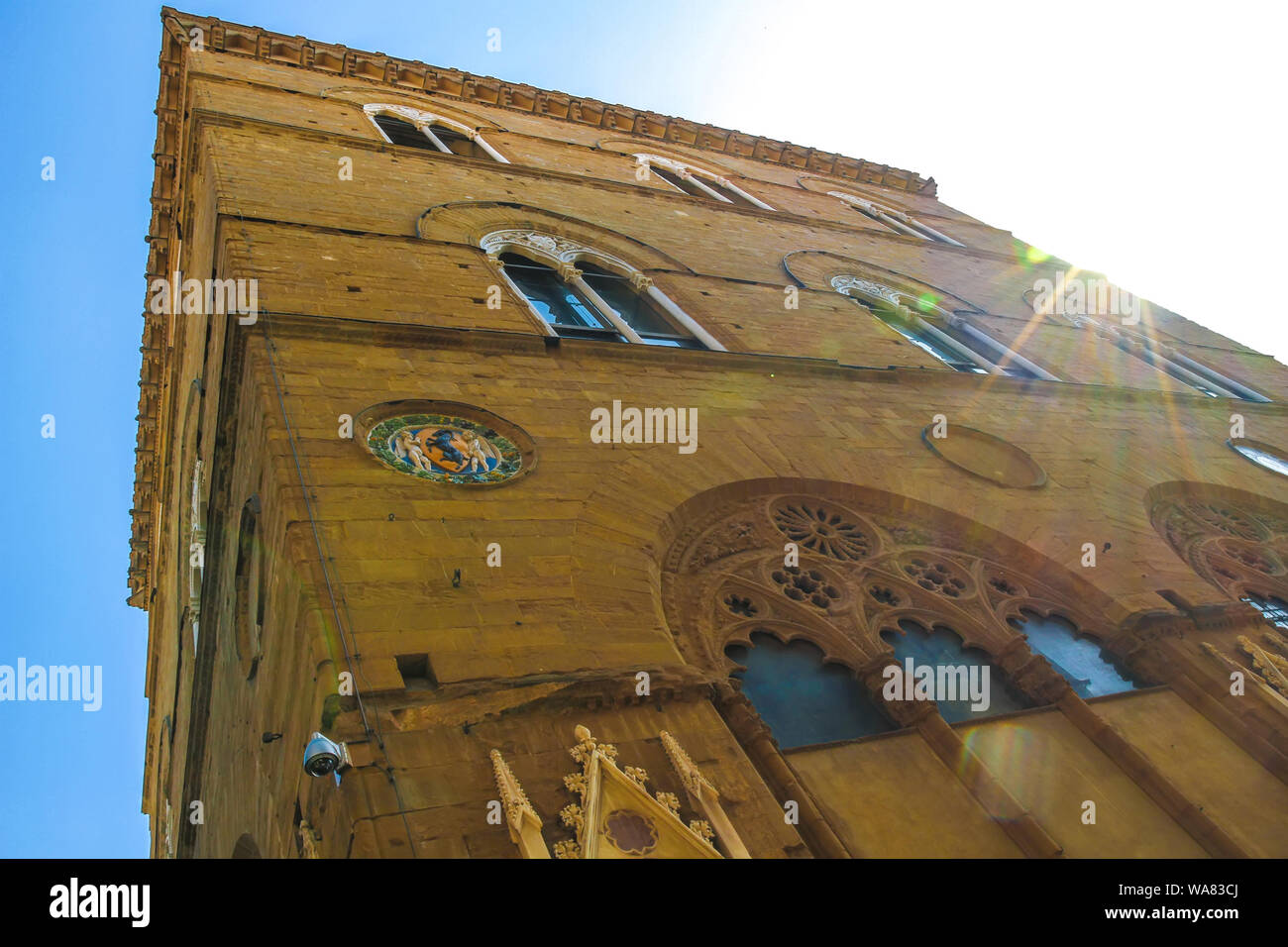 Blick auf die Orsanmichele Kirche in Florenz, Italien, an einem sonnigen Tag. Stockfoto