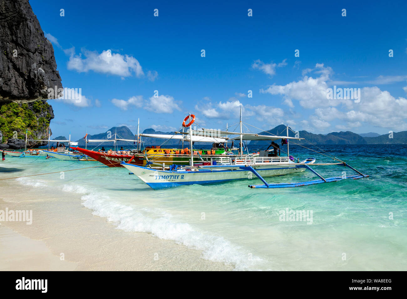 Traditionelle hölzerne Banca Boote bei Entalula Strand, El Nido, Palawan, Philippinen Stockfoto