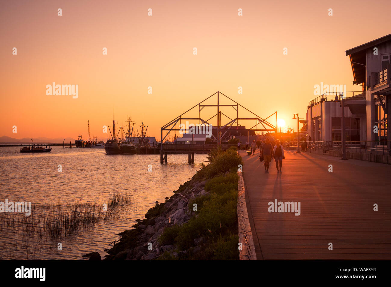 Sonnenuntergang über Fisherman's Wharf in Steveston Village, Richmond, Vancouver, British Columbia, Kanada. Stockfoto