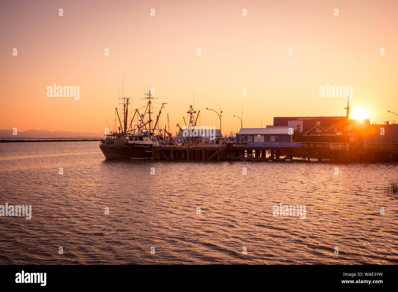 Sonnenuntergang über Fisherman's Wharf in Steveston Village, Richmond, Vancouver, British Columbia, Kanada. Stockfoto