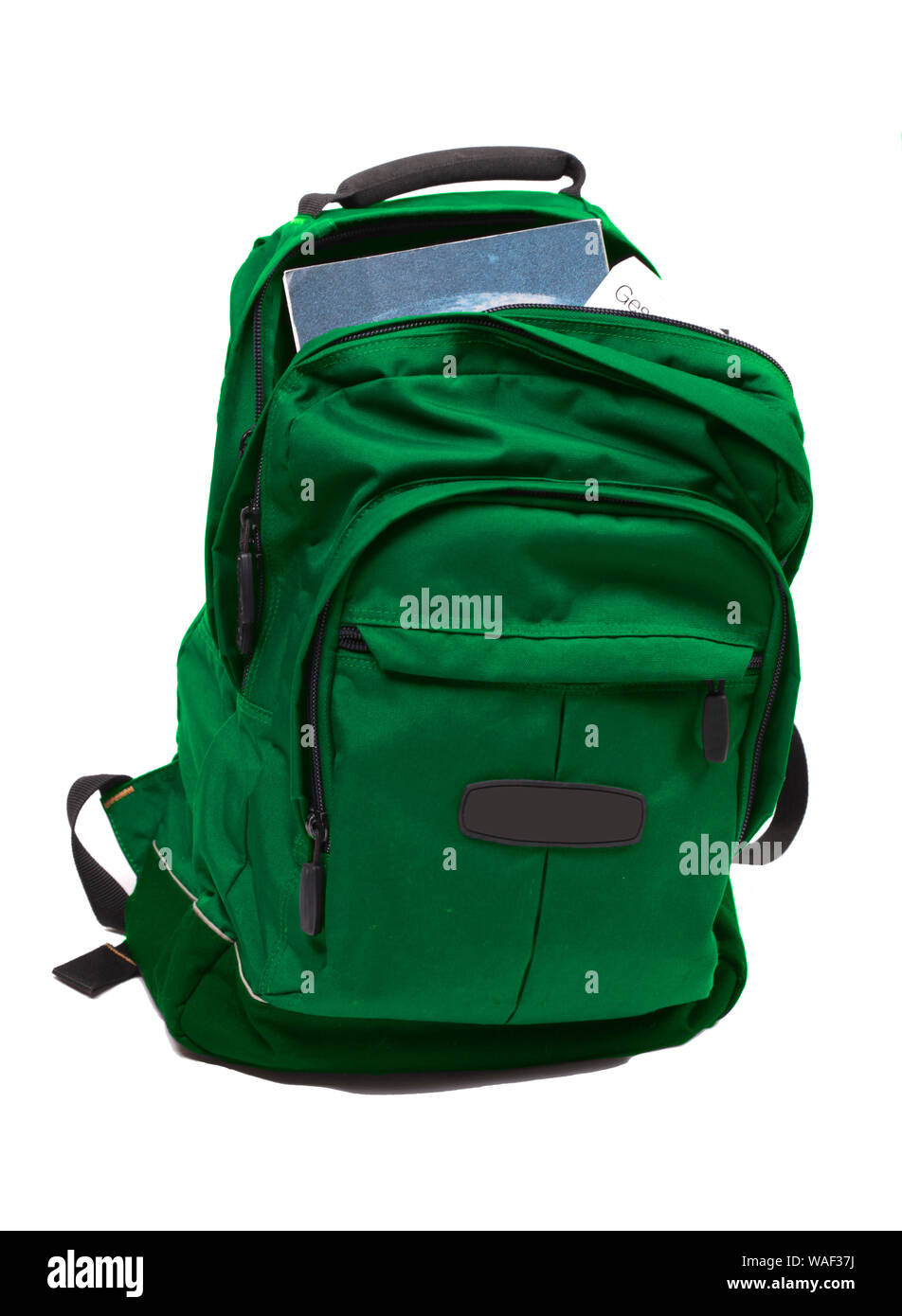 Rucksack voll mit Schulbüchern Stockfoto
