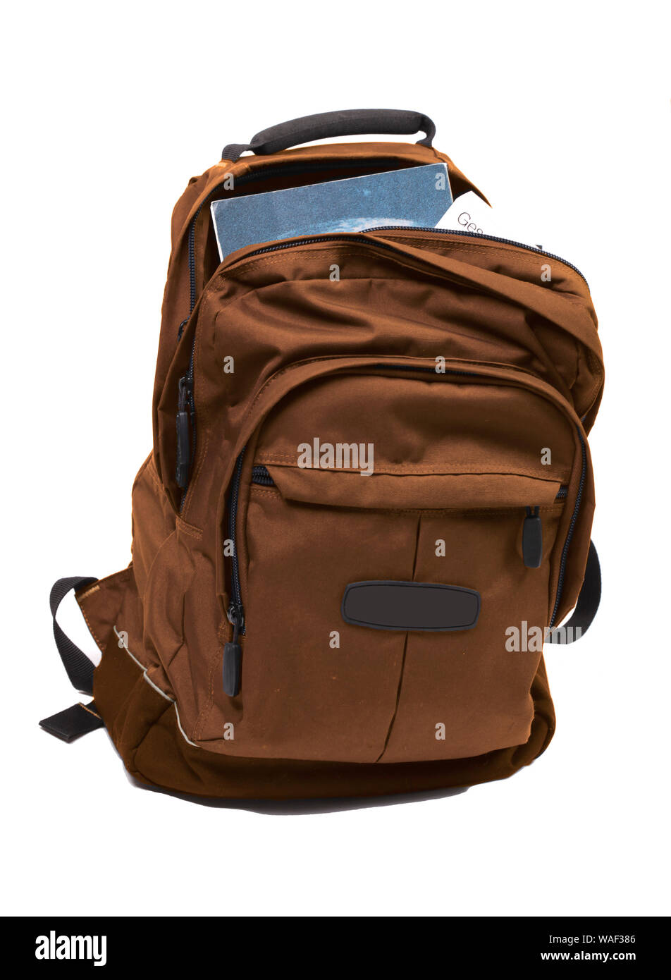 Rucksack voll mit Schulbüchern Stockfoto
