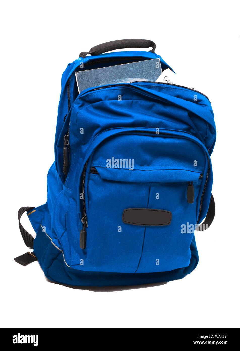 Rucksack voll mit Schulbüchern Stockfoto