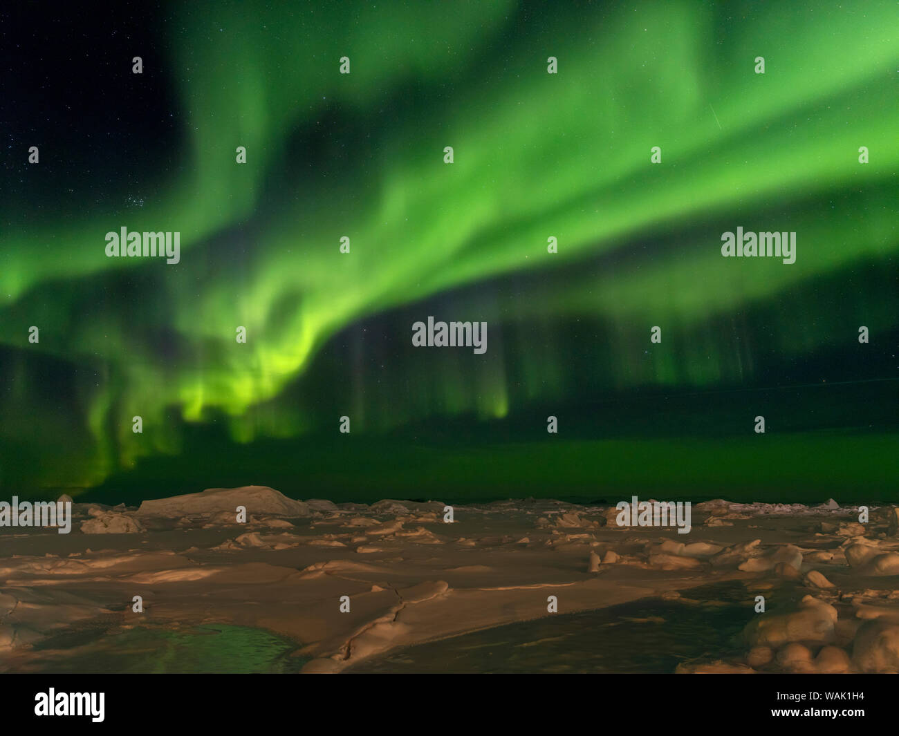 Nordlicht über den gefrorenen Disko Bucht. Grönland. Stockfoto