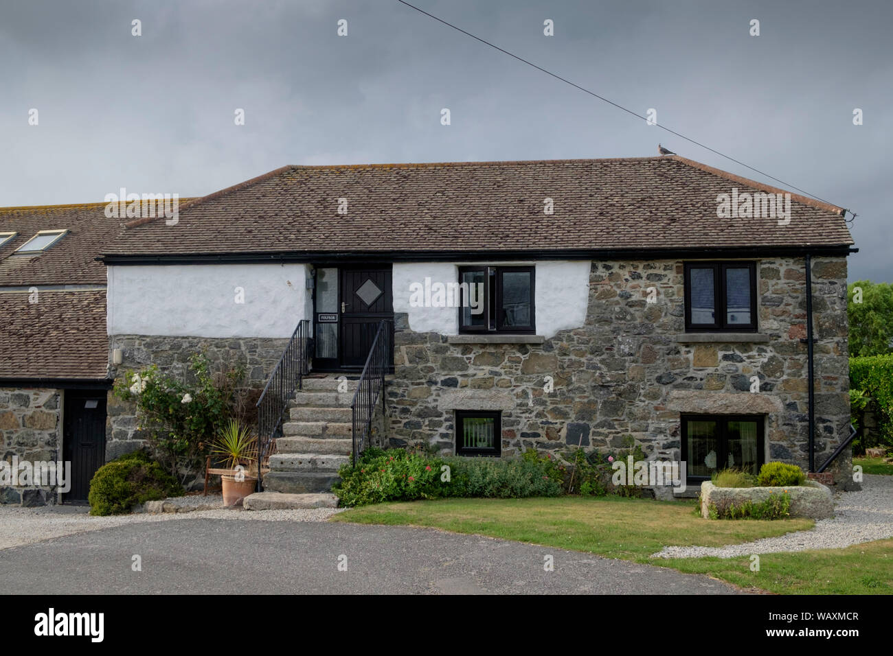 Ein Ferienhaus im Dorf Mullion, Lizard, Cornwall, Großbritannien Stockfoto