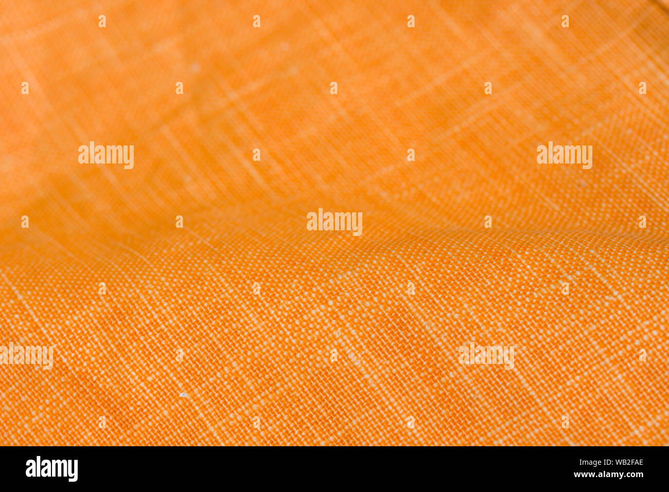 Zerknitterte Farbe orange background Textur Stockfoto