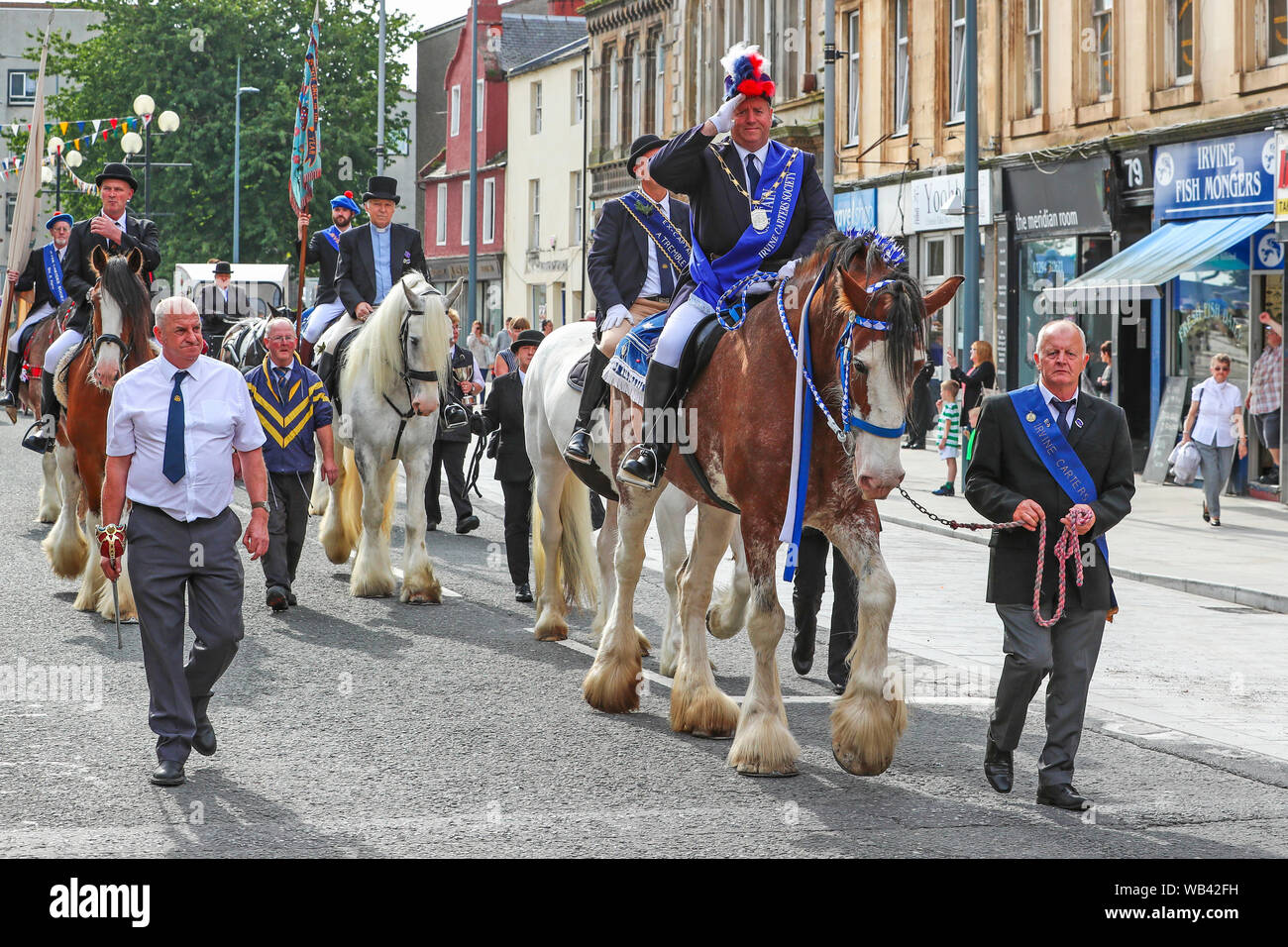 Irvine, UK. 24. August 2019. Von Irvine Marymass Festival ist ein historisches Ereignis, das als mittelalterliche Horse Show begann und ist jetzt der größte Festival im Westen von Schottland zieht über 20.000 Besucher jährlich. Diese historische Festzug durch "Die Irvine Carters 'Gesellschaft', die zuerst für Unternehmen und gemeinnützige Zwecke gebildet wurde, und kann seine Ursprünge zurück bis 1753 Trace organisiert. Bild von DANNY KERR aus Irvine, der Kapitän der Carters für 13 Jahre gewesen. Credit: Findlay/Alamy leben Nachrichten Stockfoto