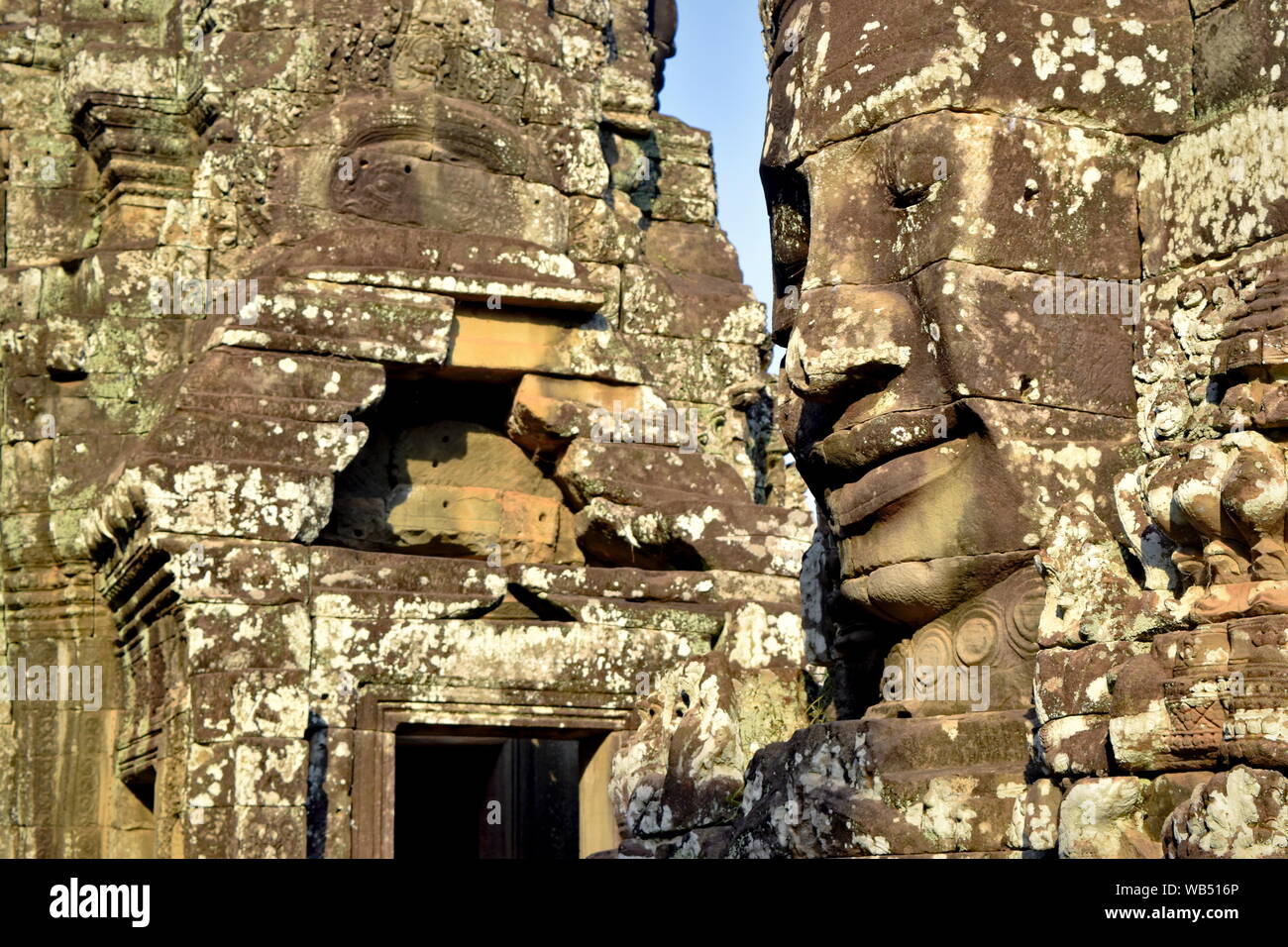 Buddha Gesichter auf antiken Tempel Türme des Bayon, Angkor Thom, Kambodscha Stockfoto