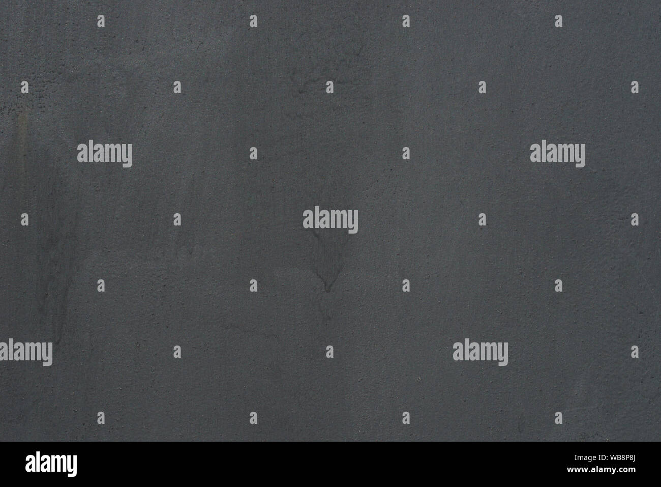 Farbe schwarz lackierte metallische Wand Textur Hintergrund Stockfoto
