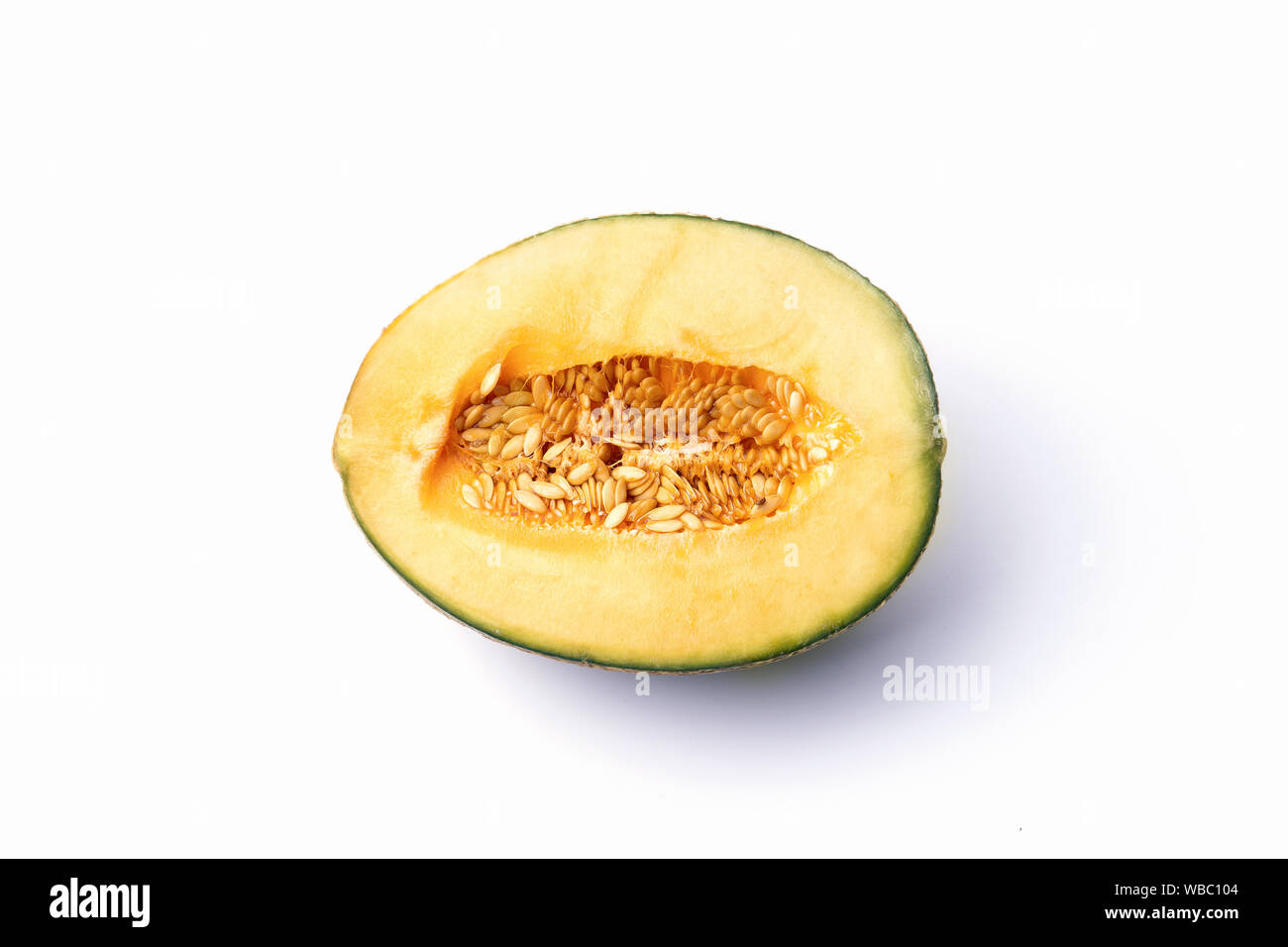 Schneiden natürliche Melone, ein gesundes Produkt voller Vitamine. Für Werbung veganes Essen und Lebensstil. Stockfoto