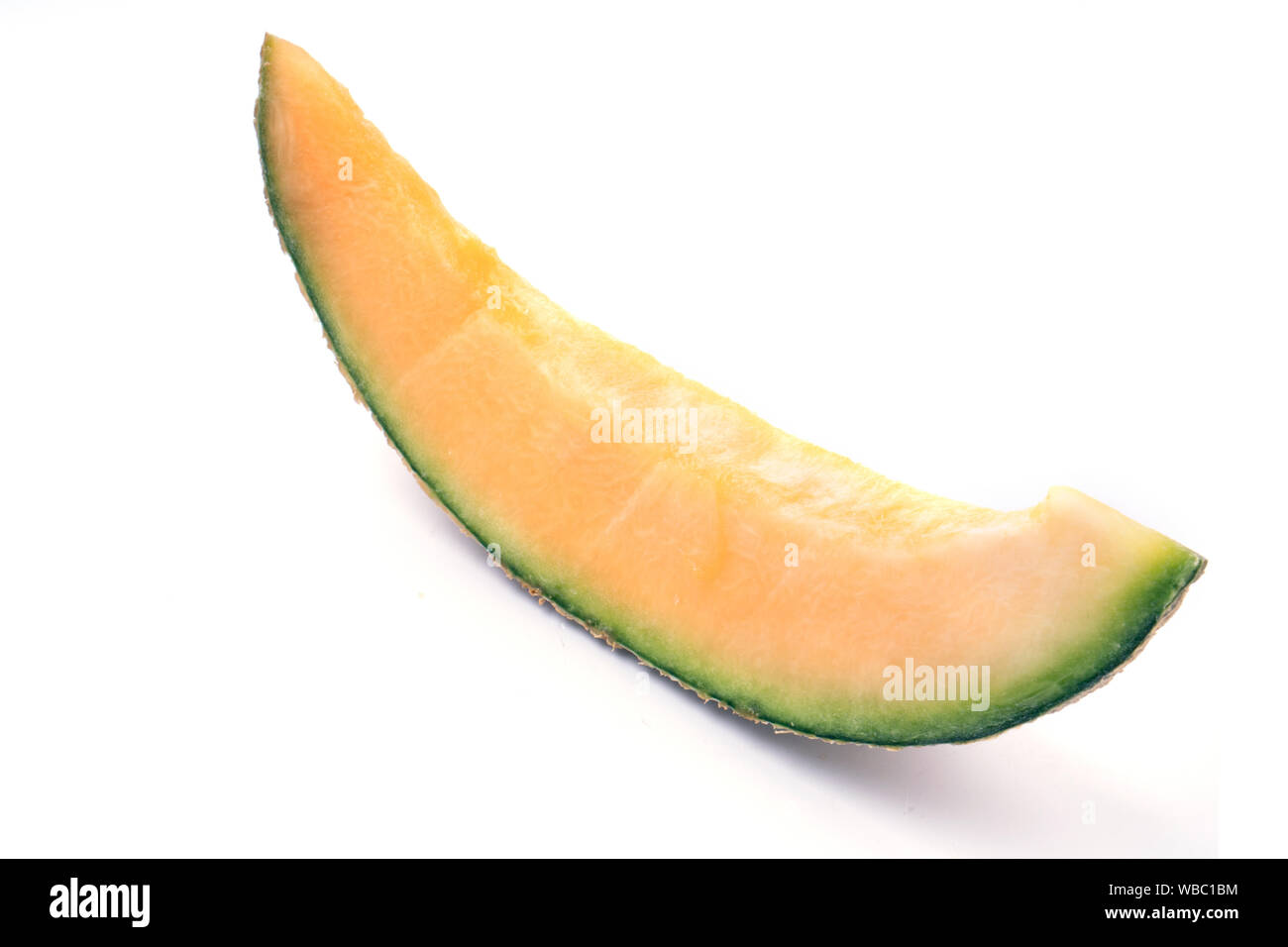 Schneiden natürliche Melone, ein gesundes Produkt voller Vitamine. Für Werbung veganes Essen und Lebensstil. Stockfoto