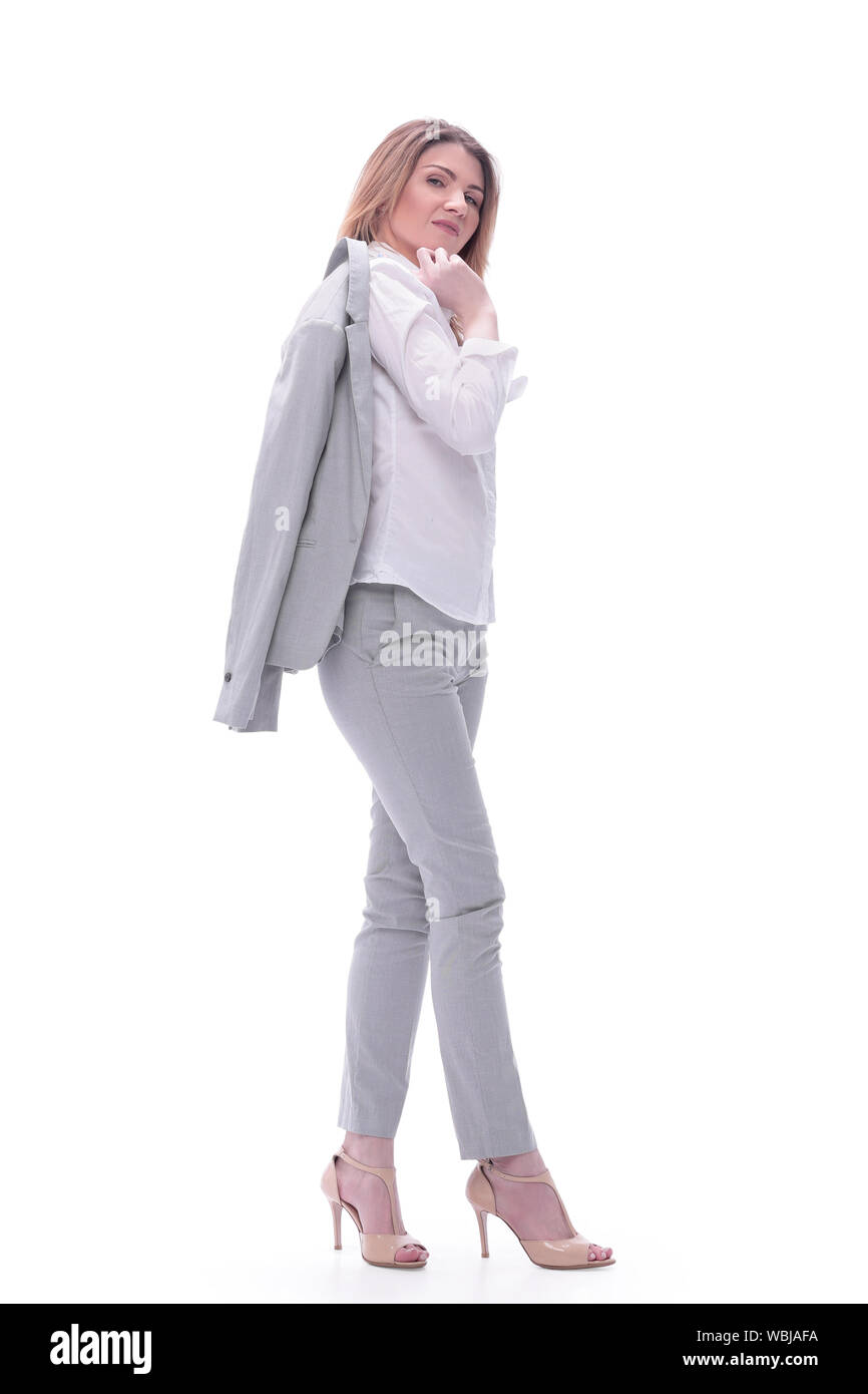 Junge Geschäftsfrau mit einer Jacke über die Schulter. isoliert auf weißem Stockfoto