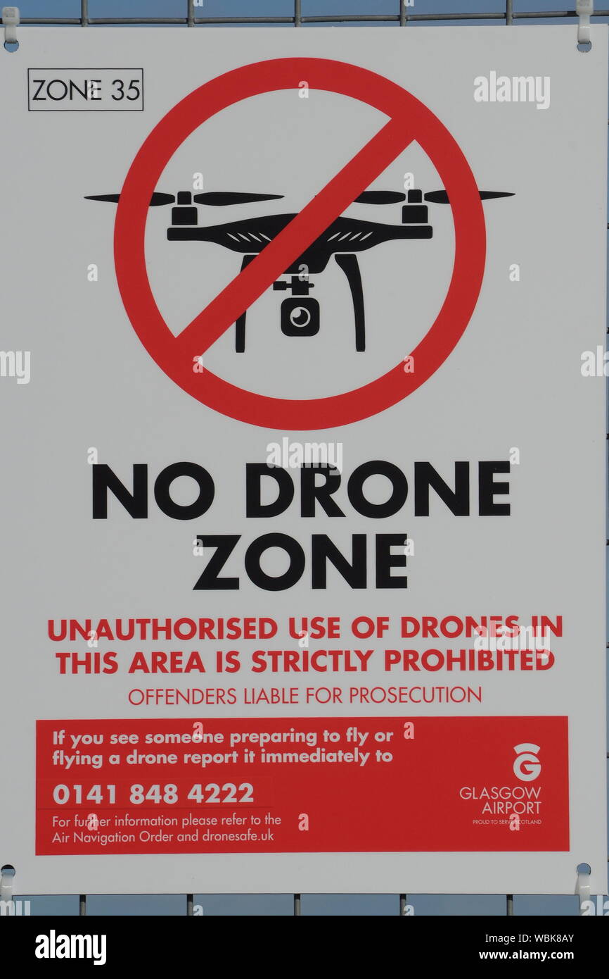 Flughafen Unterbrechungen - KEIN DRONE ZONE SCHILD AM FLUGHAFEN GLASGOW. Stockfoto