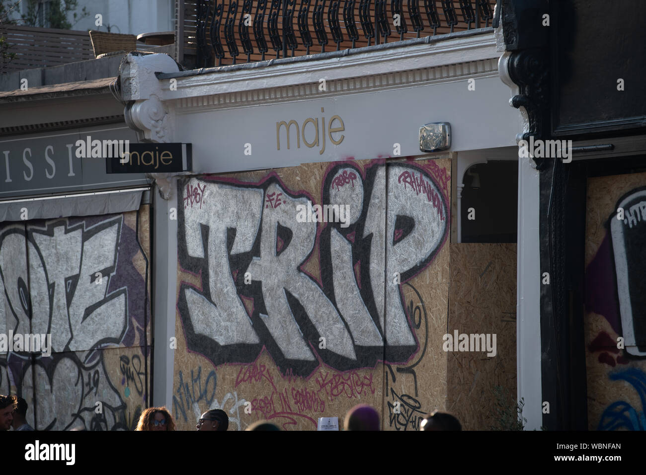 Weiße Sprühfarbe Graffiti an der Notting Hill Carnival. Stockfoto
