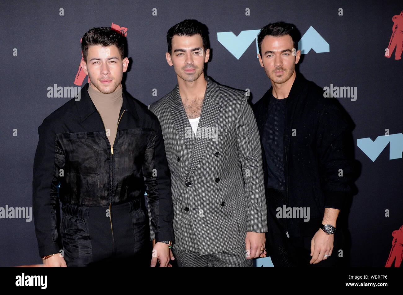 Newark, USA. 27 Aug, 2019. (L-R) Nick Jonas, Joe Jonas, Kevin Jonas an der 2019 MTV Video Music Video Awards im Prudential Center in Newark, NJ: SOPA Images Limited/Alamy Leben Nachrichten gehalten Stockfoto