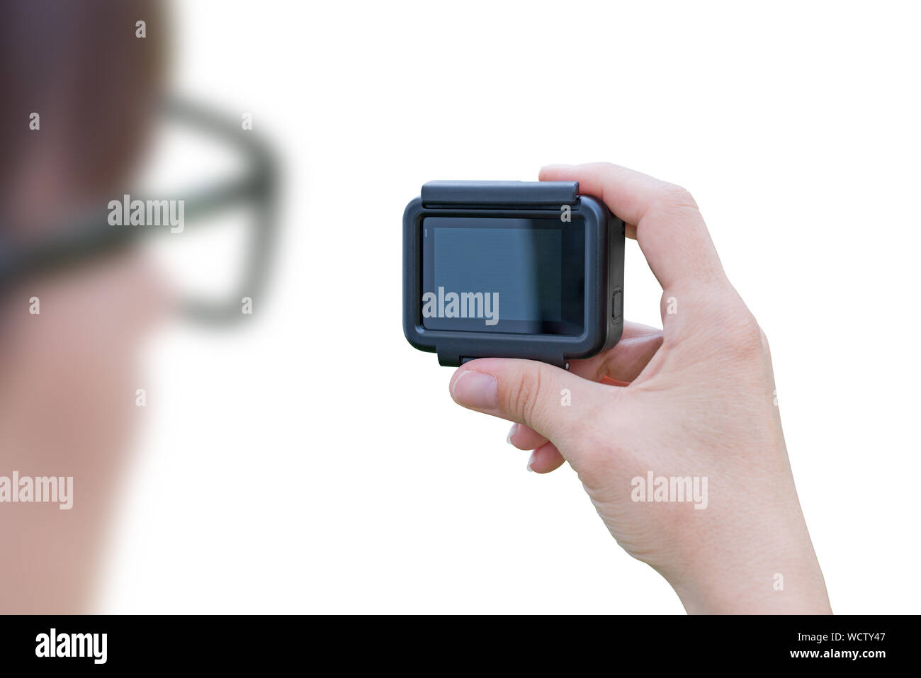 Frau mit Action Kamera isoliert, close-up. Stockfoto