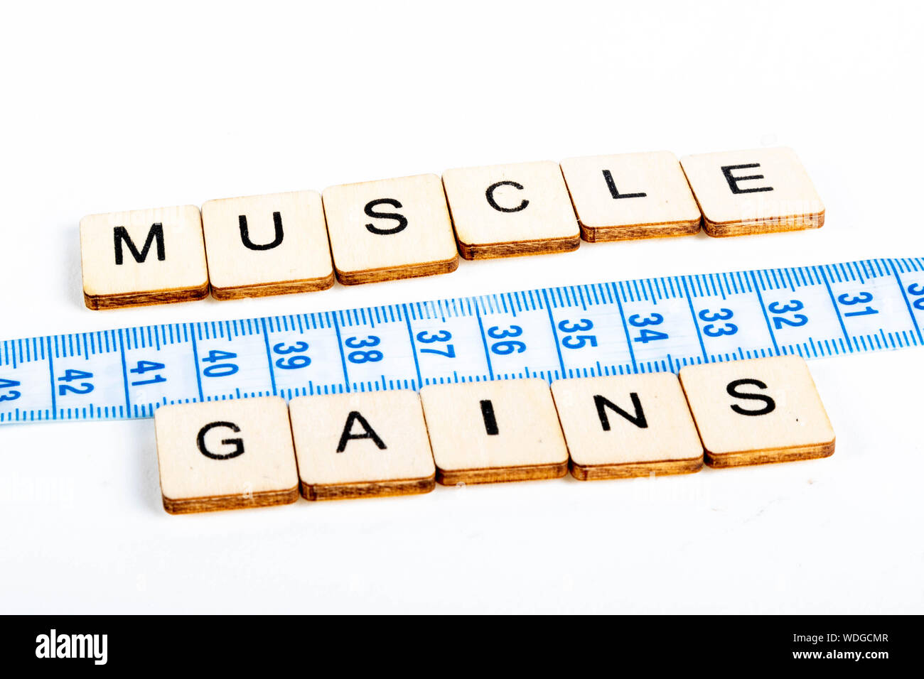 Gesundheit Konzept von einem Maßband messen auch die Nachricht Muskeln Gewinne Stockfoto