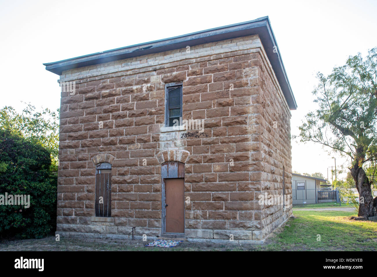 Im Jahre 1878 in der ursprünglichen Callahan County Seat von Belle Plaine, das ehemalige Gefängnis House wurde der neue Sitz von Baird 1883 verschoben. Stockfoto