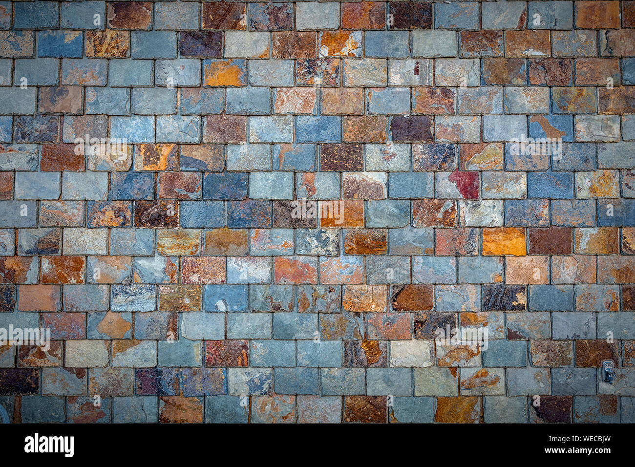 Ein grungy Hintergrund Textur von Stein, Schiefer Fliesen. Stockfoto