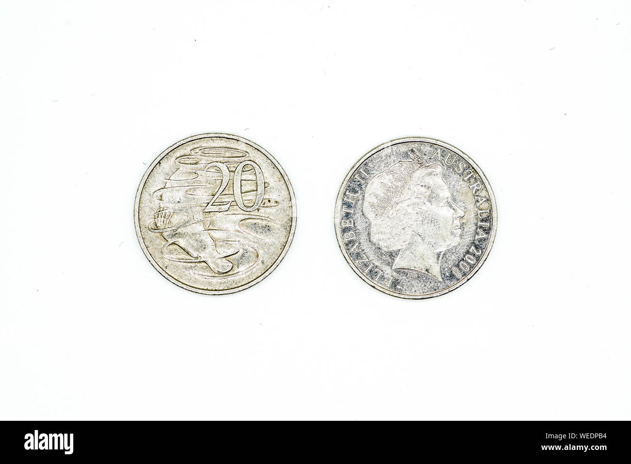 Australian Dollar Münzen auf weißem Hintergrund. 20 Cent. Stockfoto