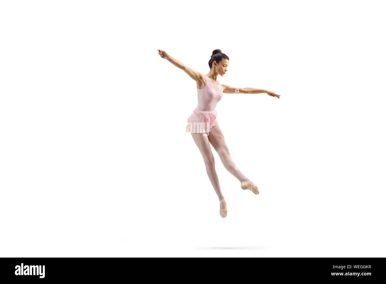 Volle Länge Schuß einer Ballerina, die einen Sprung auf weißem Hintergrund Stockfoto