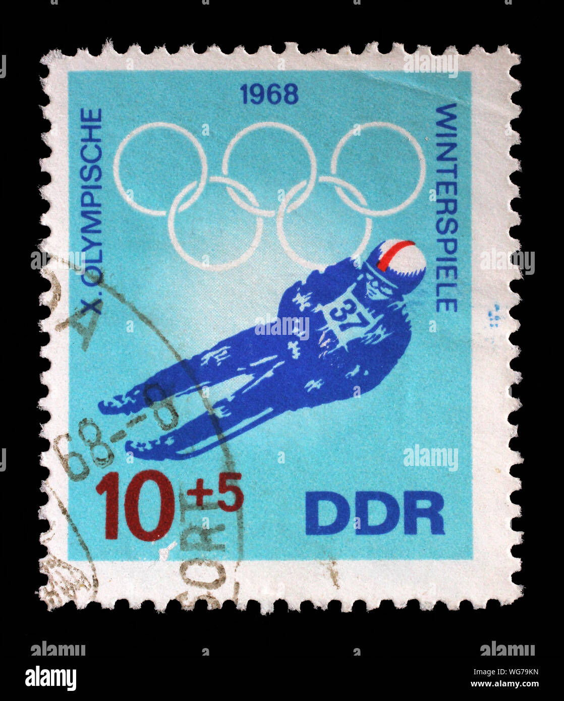Stempel ausgestellt in Deutschland - Demokratische Republik (DDR) zeigt Luge, die olympischen Winterspiele 1968 in Grenoble, circa 1968. Stockfoto