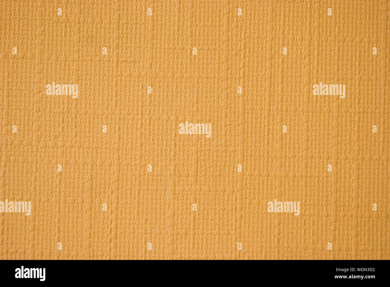Textur der beige-orange Wand - Foto. Hintergrund. Das Element der Architektur. Innere element Stockfoto