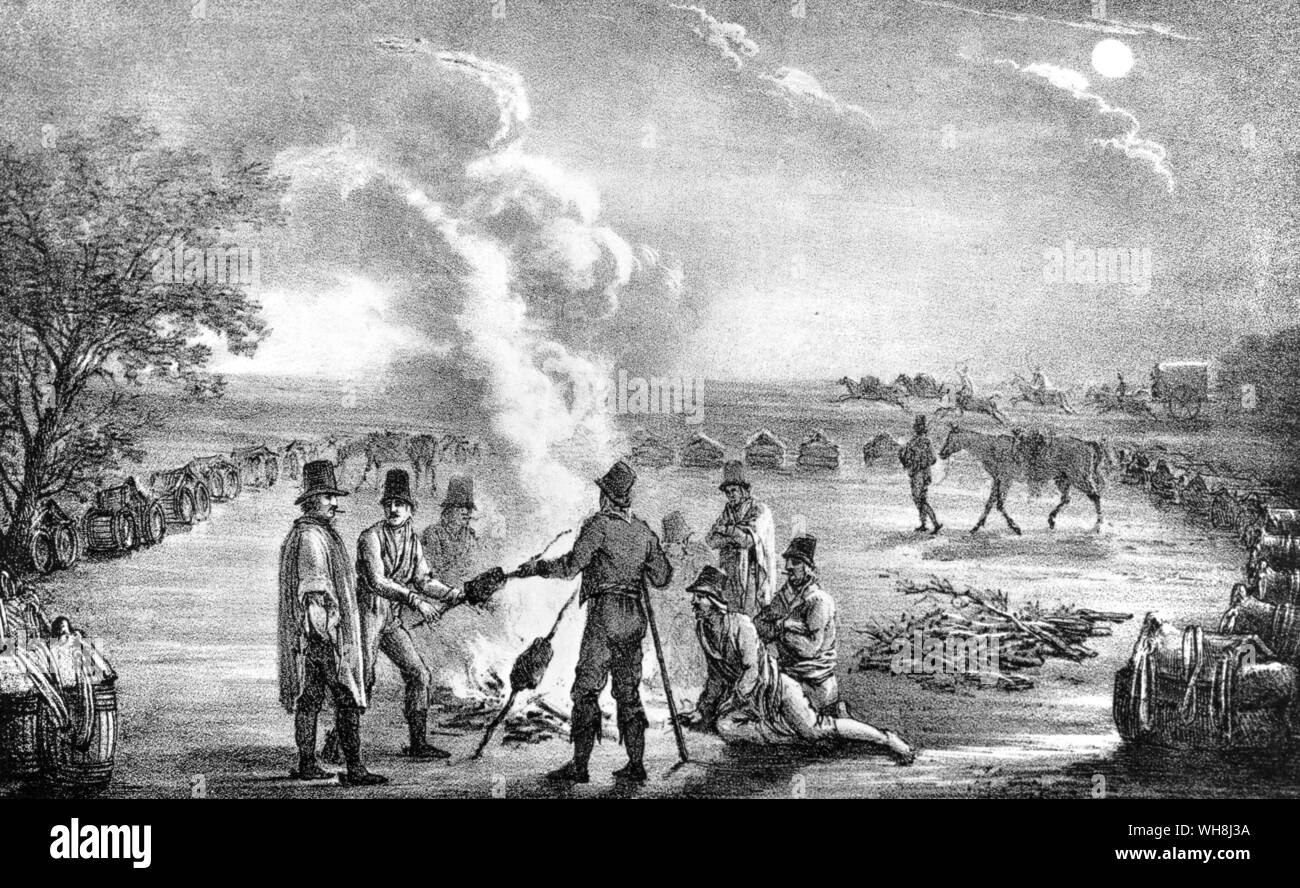 Mulateers an einem Lagerfeuer. Darwin und der Beagle von Alan Moorhead, Seite 179. Stockfoto