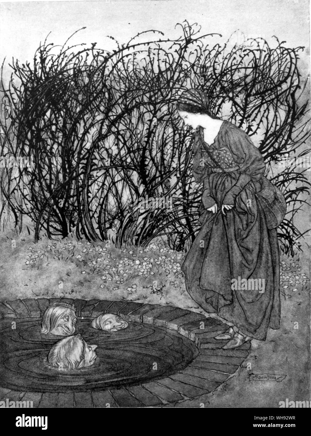 Die drei Köpfe in der Gut von Arthur Rackman. Aus dem Englischen Märchen, 1918. . (Farbe Platte in Buch) Stockfoto