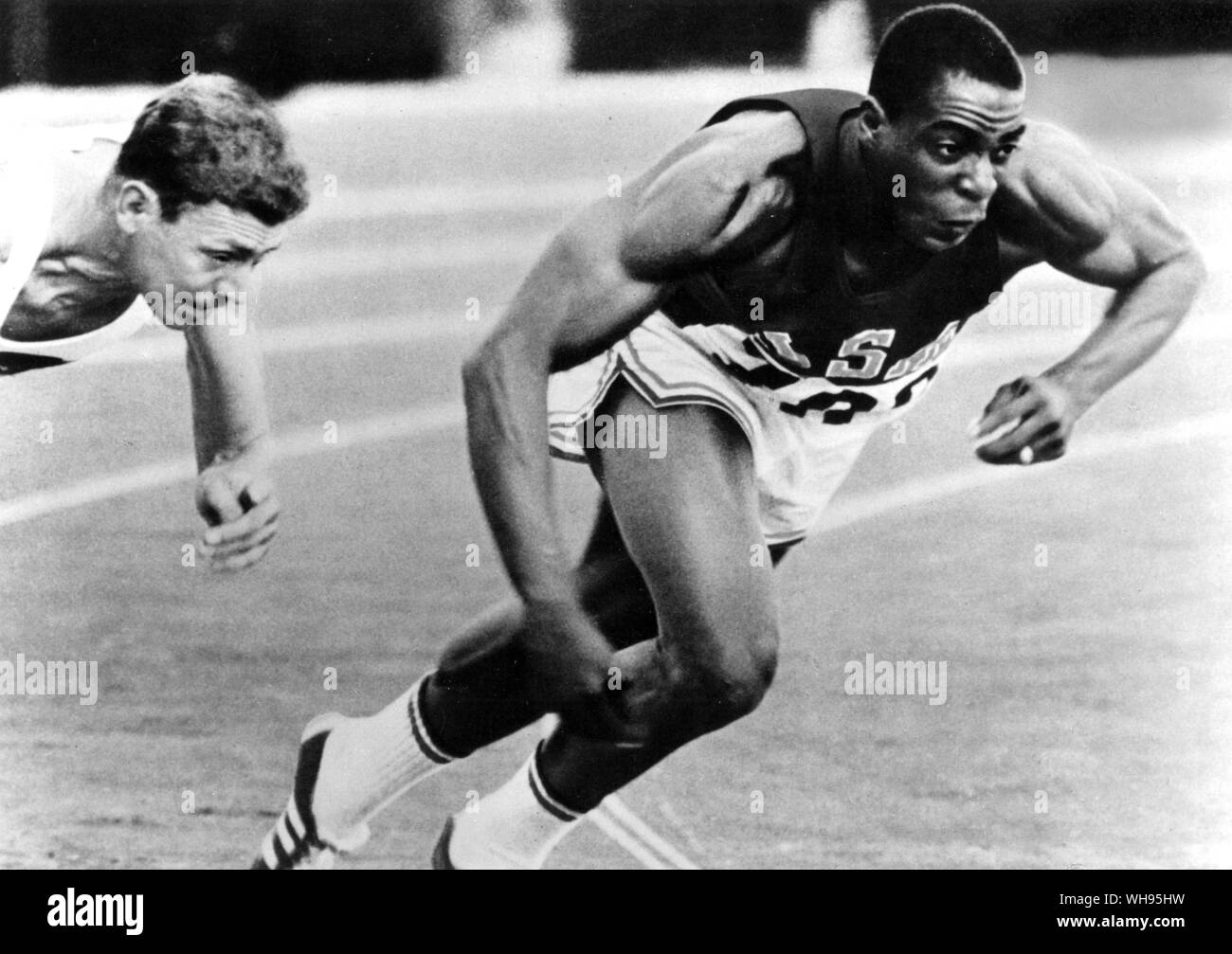 Japan, Olympischen Spielen in Tokio, 1964: Robert Hayes (USA). Seine rollenden schwerfälligen Stil irritiert die connoiseurs von sprinten! Stockfoto