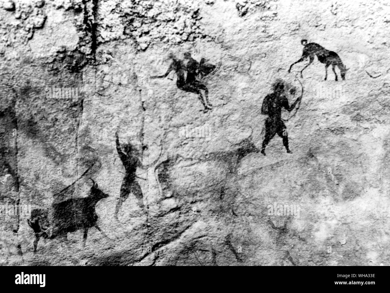 Der frühe Mensch: Höhlenmalereien. Tassili Gemälde (Algerien) Stockfoto