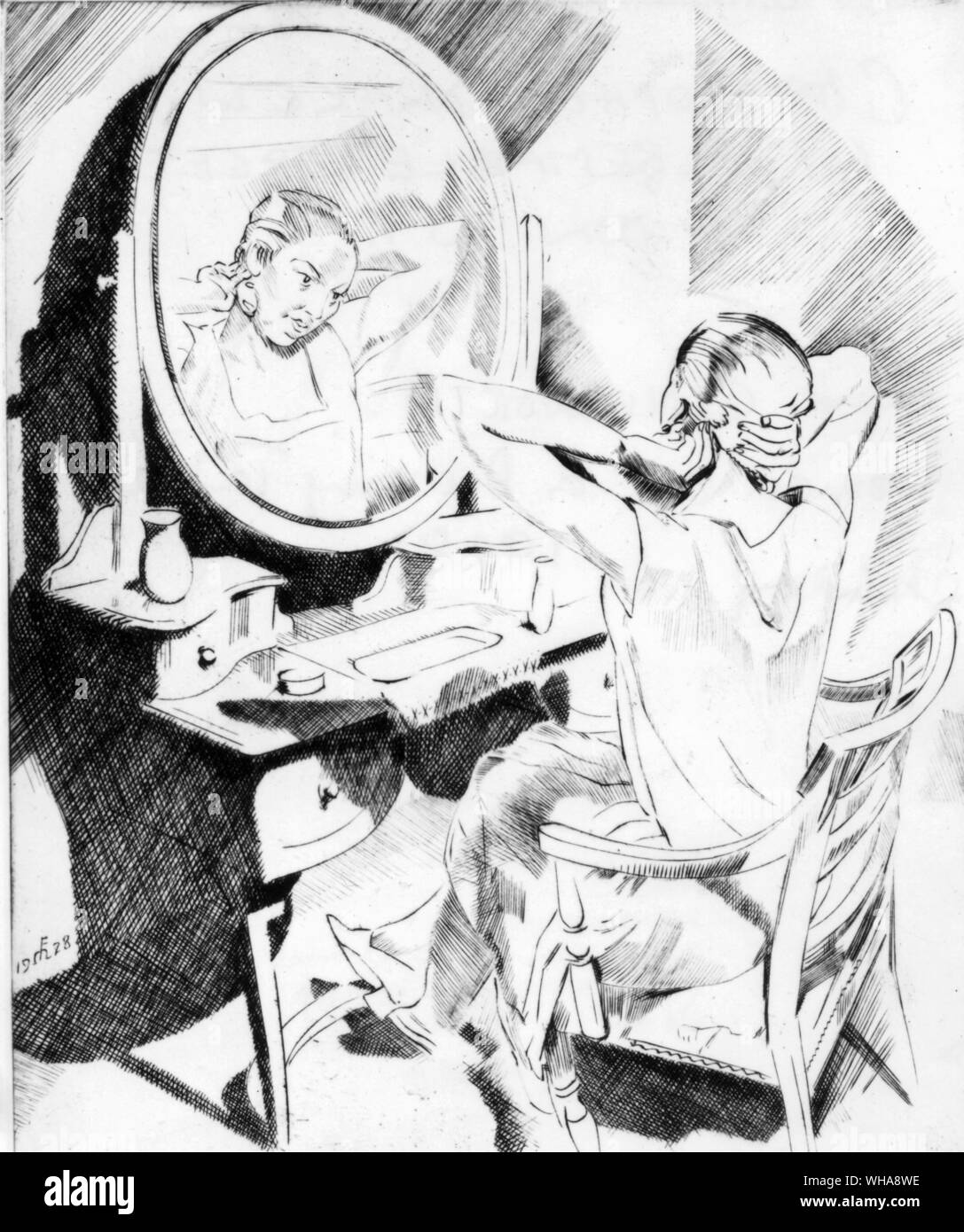 Frau an einem Schminktisch. von Frank C Medworth. 1928 Stockfoto