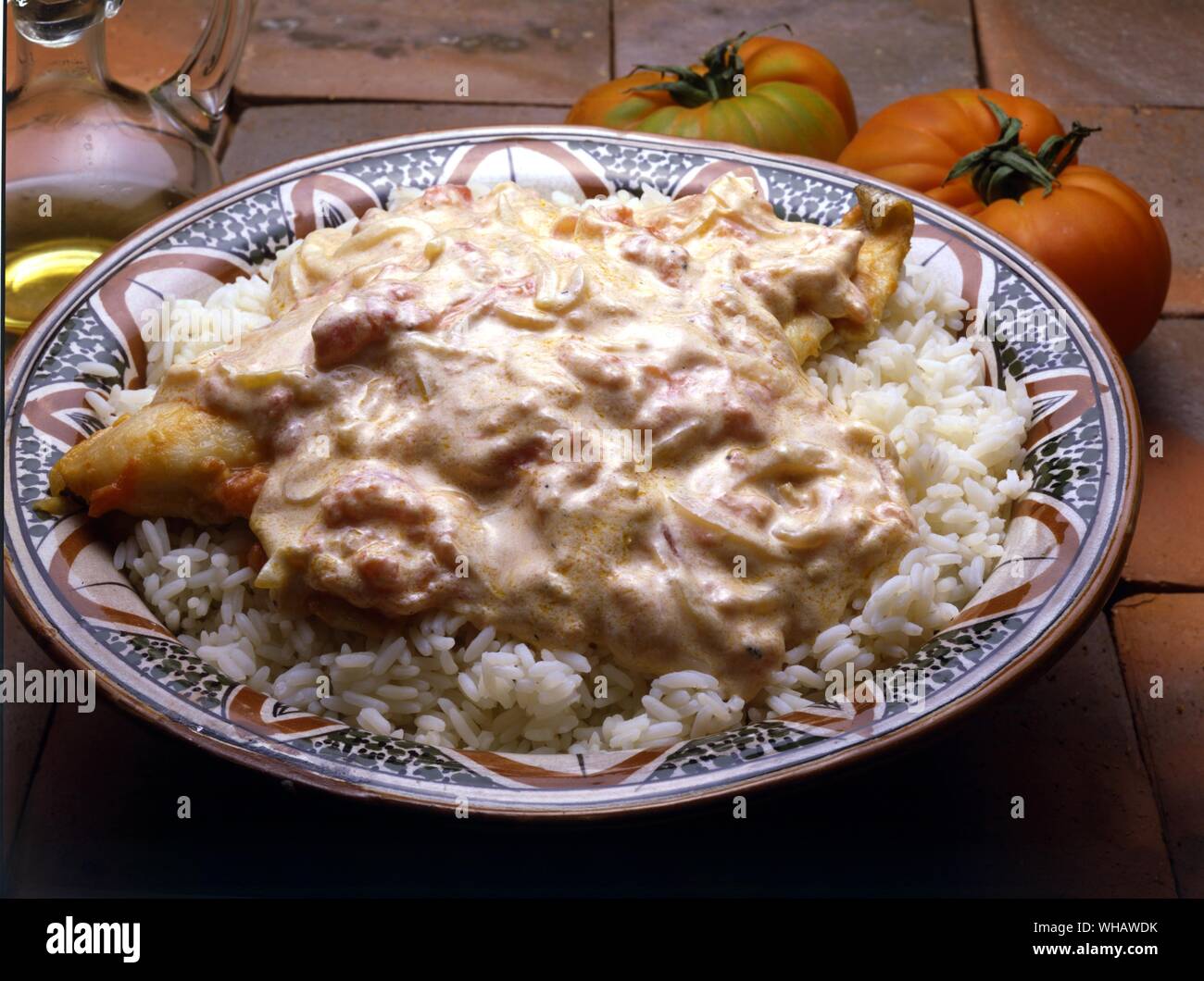 Italienische Küche von Robin Howe. . Riso Alle 'Indiana Con Pesce.. Indische Reis mit Fisch. Stockfoto