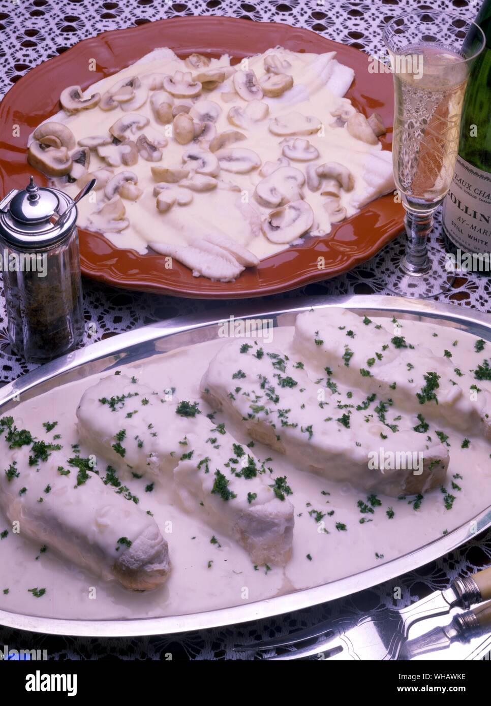 Filets de Sole au Wermutwein. Filets von Sole von wermutwein. . Fletan au Muscadet. Heilbutt in Weißweinsauce Stockfoto