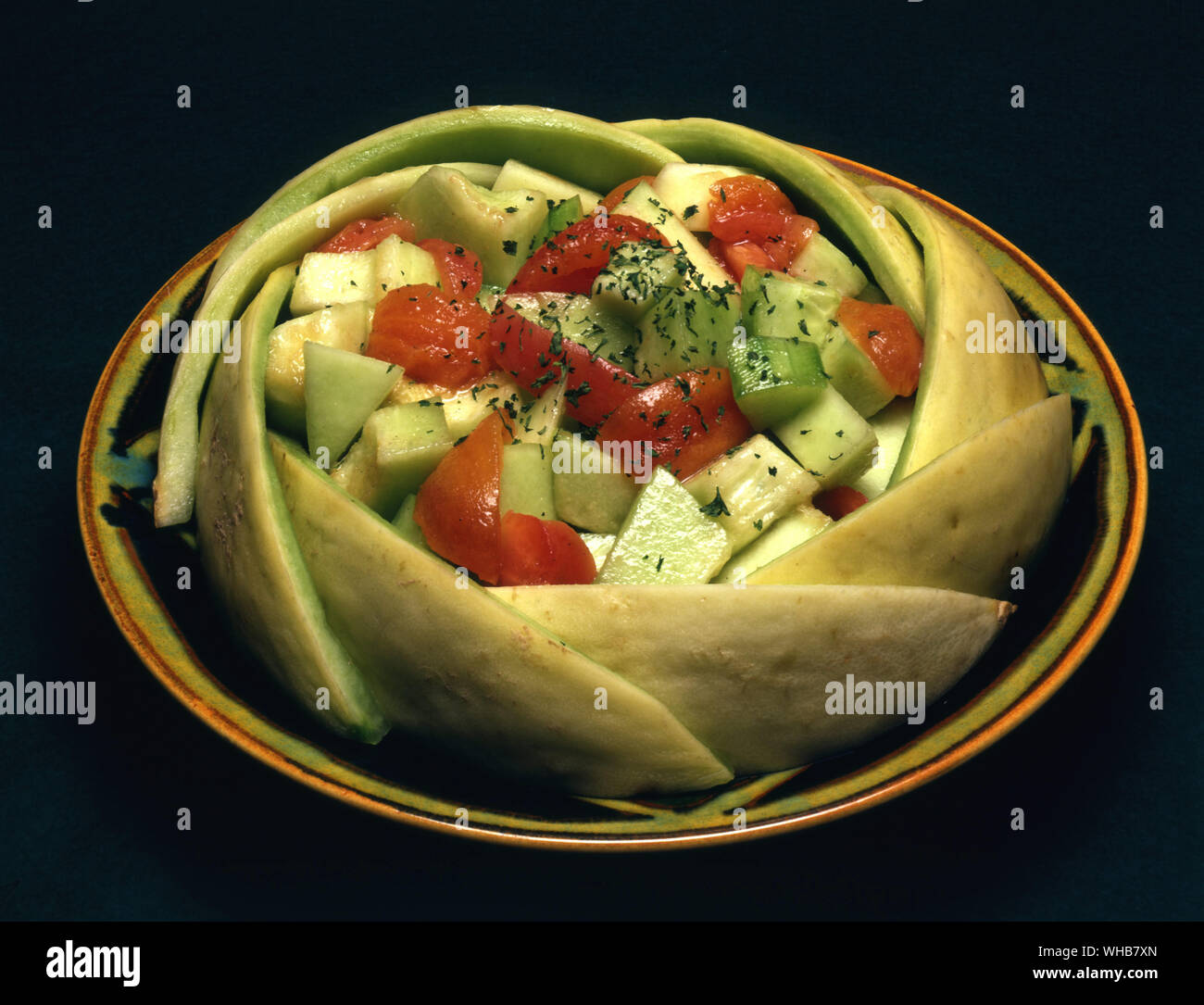 Melone Tomaten Gurken und Kräuter. Stockfoto