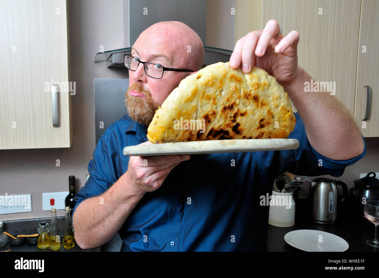 Mann, Pizza Stockfoto