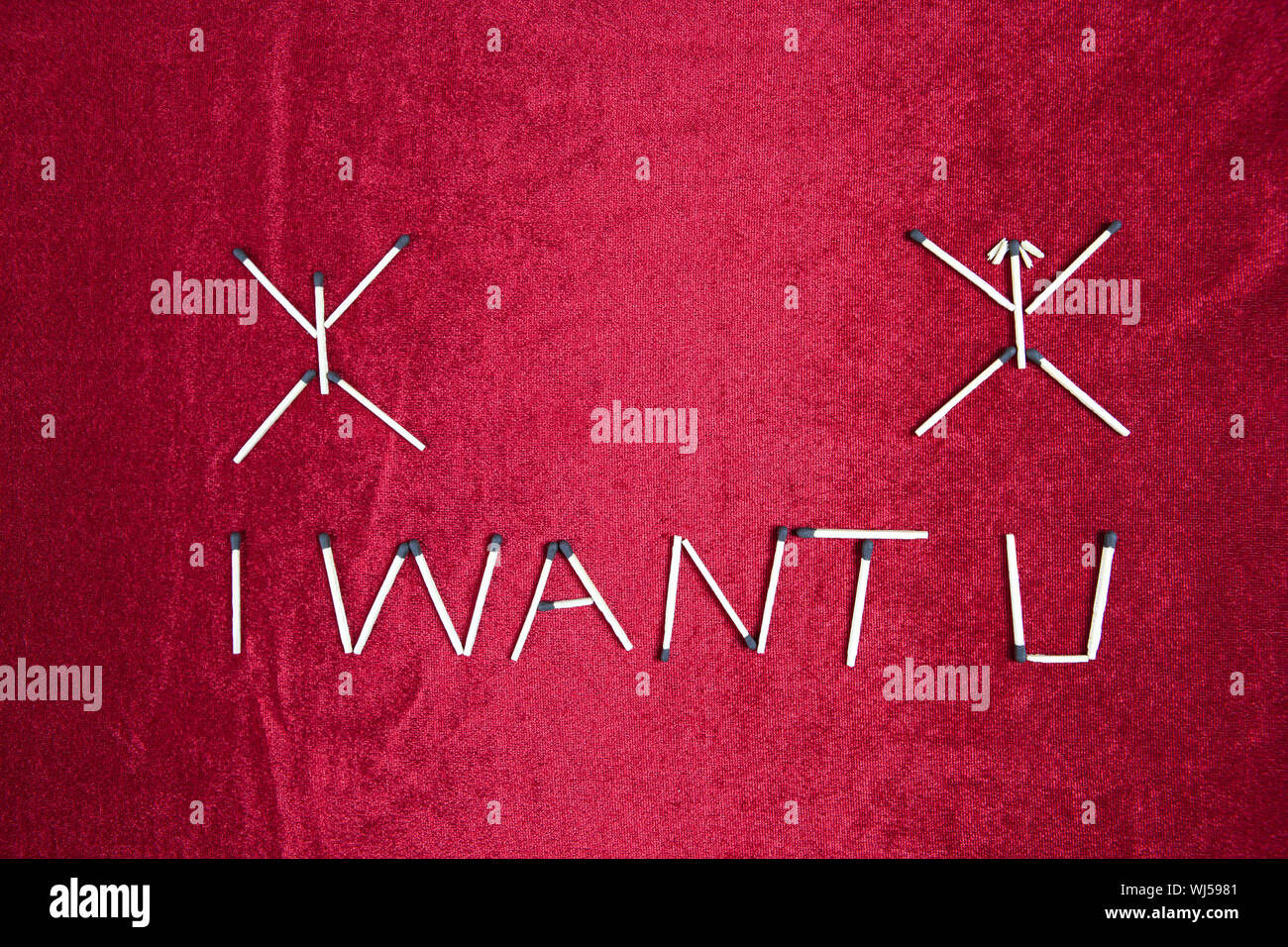 Worte 'I want U' aus Streichhölzer Stockfoto