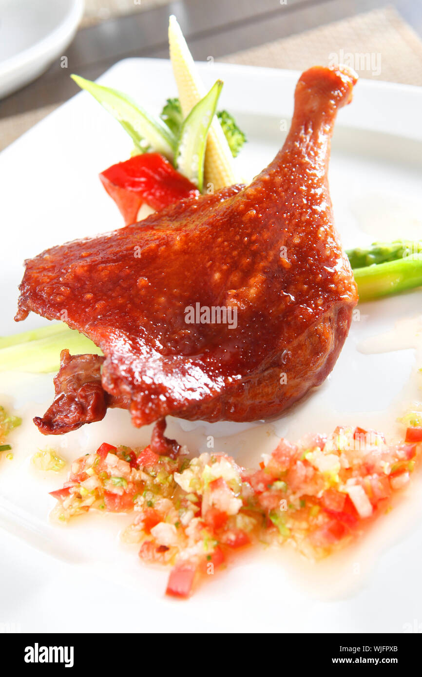 Hähnchen essen Stockfoto