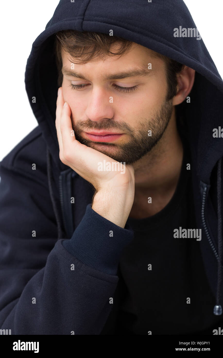 Nahaufnahme einer betonte hübscher junger Mann mit weißem Hintergrund Stockfoto