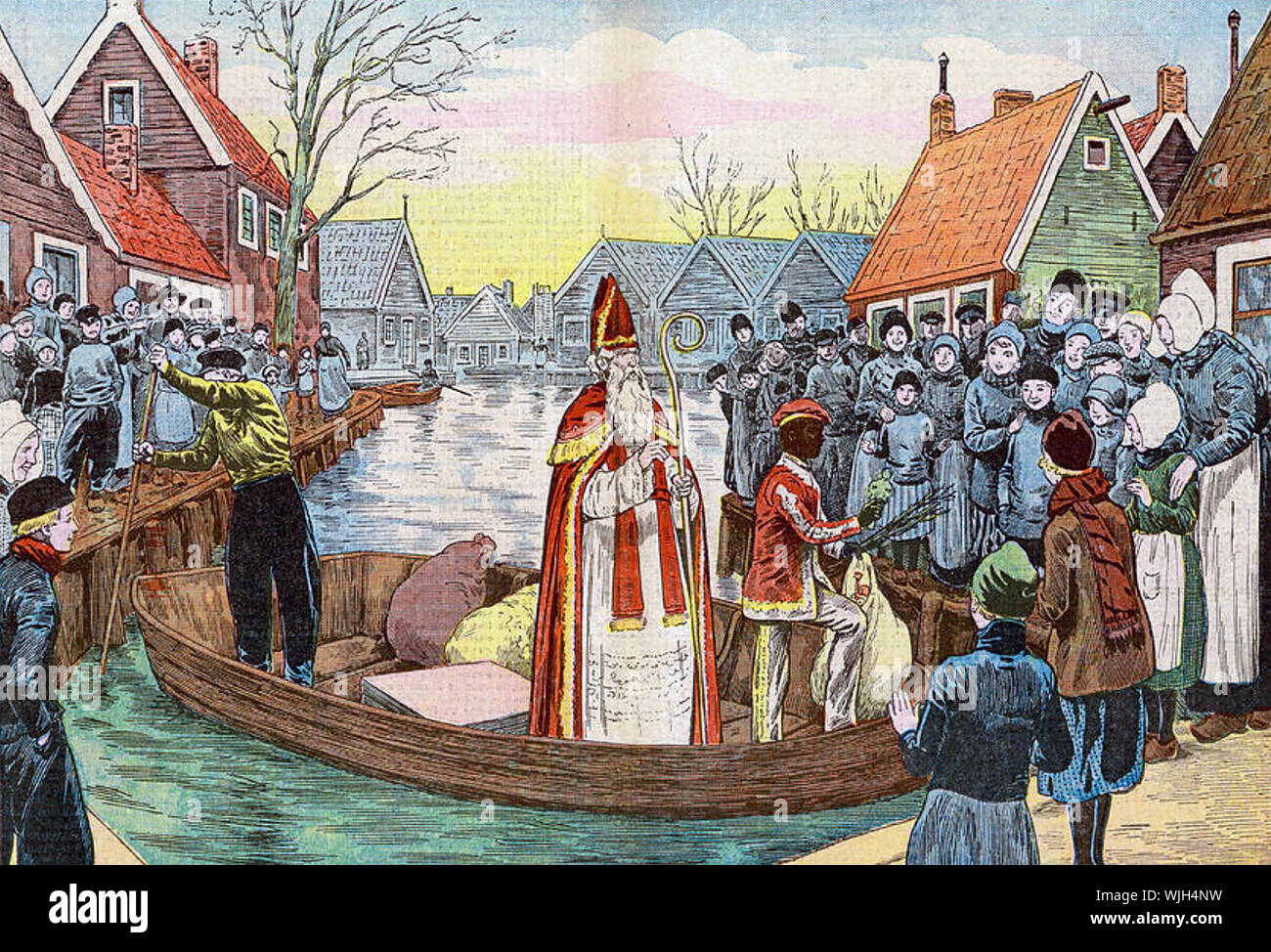 Sankt Nikolaus Besuche ein niederländisches Dorf mit präsentiert, begleitet von Schwarzer Peter, die Kinder, die schlecht benommen haben, bestrafen. Stockfoto