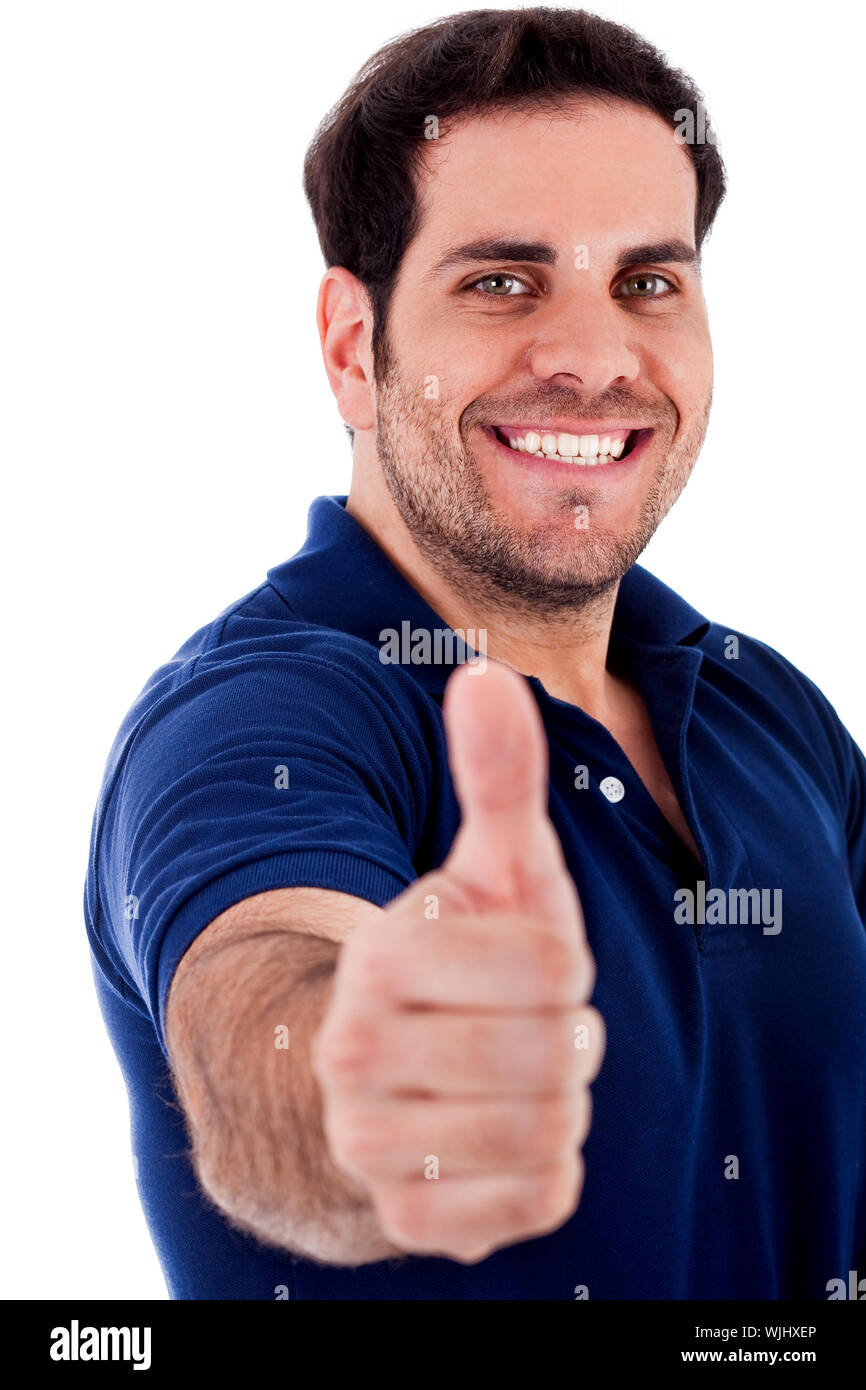 Porträt des jungen Mannes mit Daumen hoch Geste auf einen isolierten Hintergrund Stockfoto
