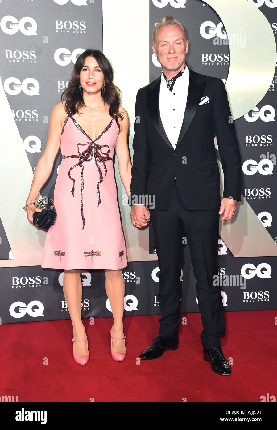 Gary Kemp (rechts) und Lauren Friseur an der GQ Männer des Jahres Awards 2019 in Verbindung mit Hugo Boss, in der Tate Modern in London anreisen. Stockfoto