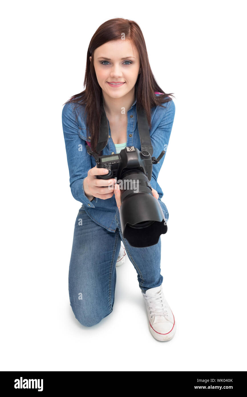 Fröhlichen jungen Fotografen posieren Stockfoto
