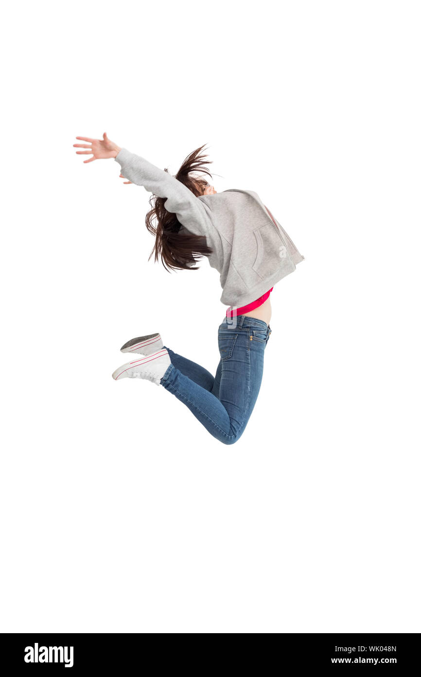 Fröhliche junge Frau springen Stockfoto