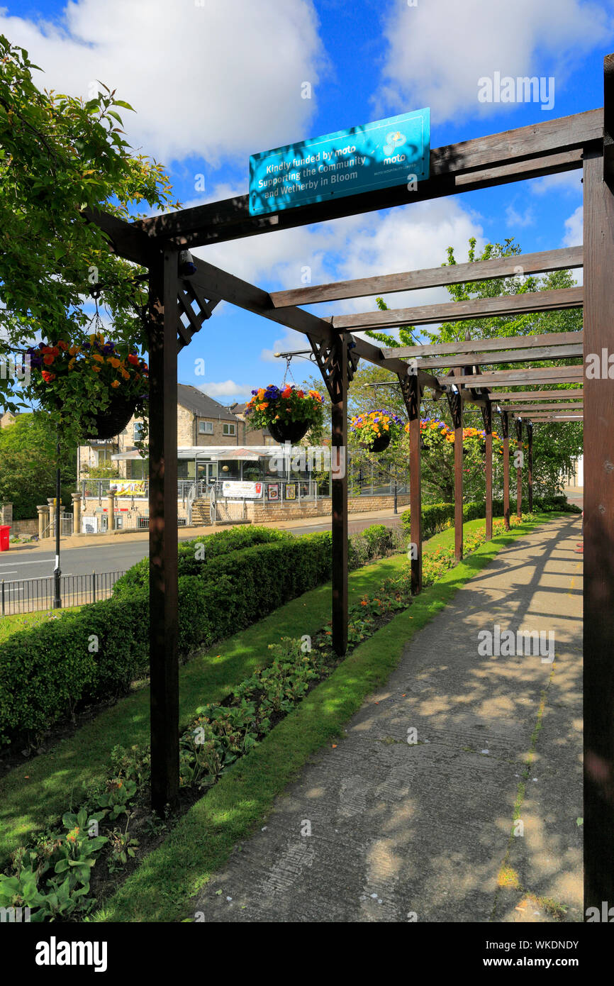 Die Rotary International Rad, Red Lion Gärten, Wetherby Stadt, North Yorkshire, England, Großbritannien Stockfoto