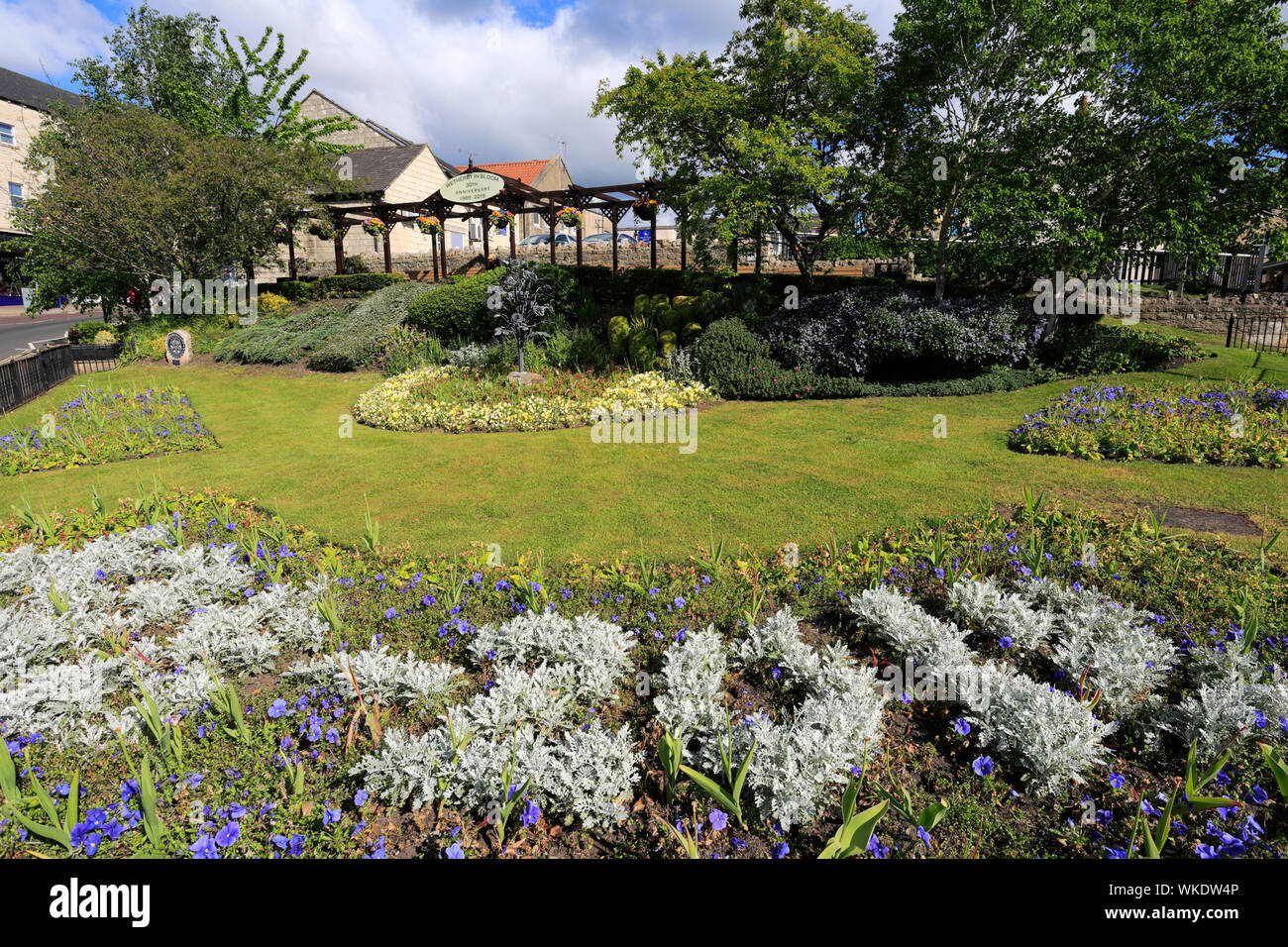 Die Rotary International Rad, Red Lion Gärten, Wetherby Stadt, North Yorkshire, England, Großbritannien Stockfoto