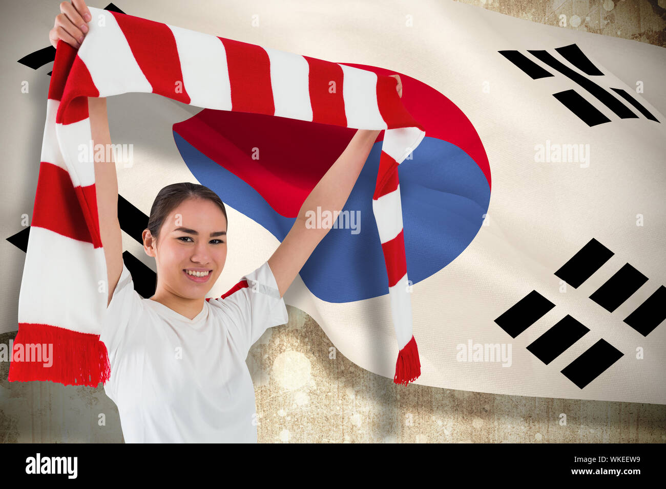 Fußball-Fan mit roten und weißen Schal gegen die Republik Korea Flagge Stockfoto