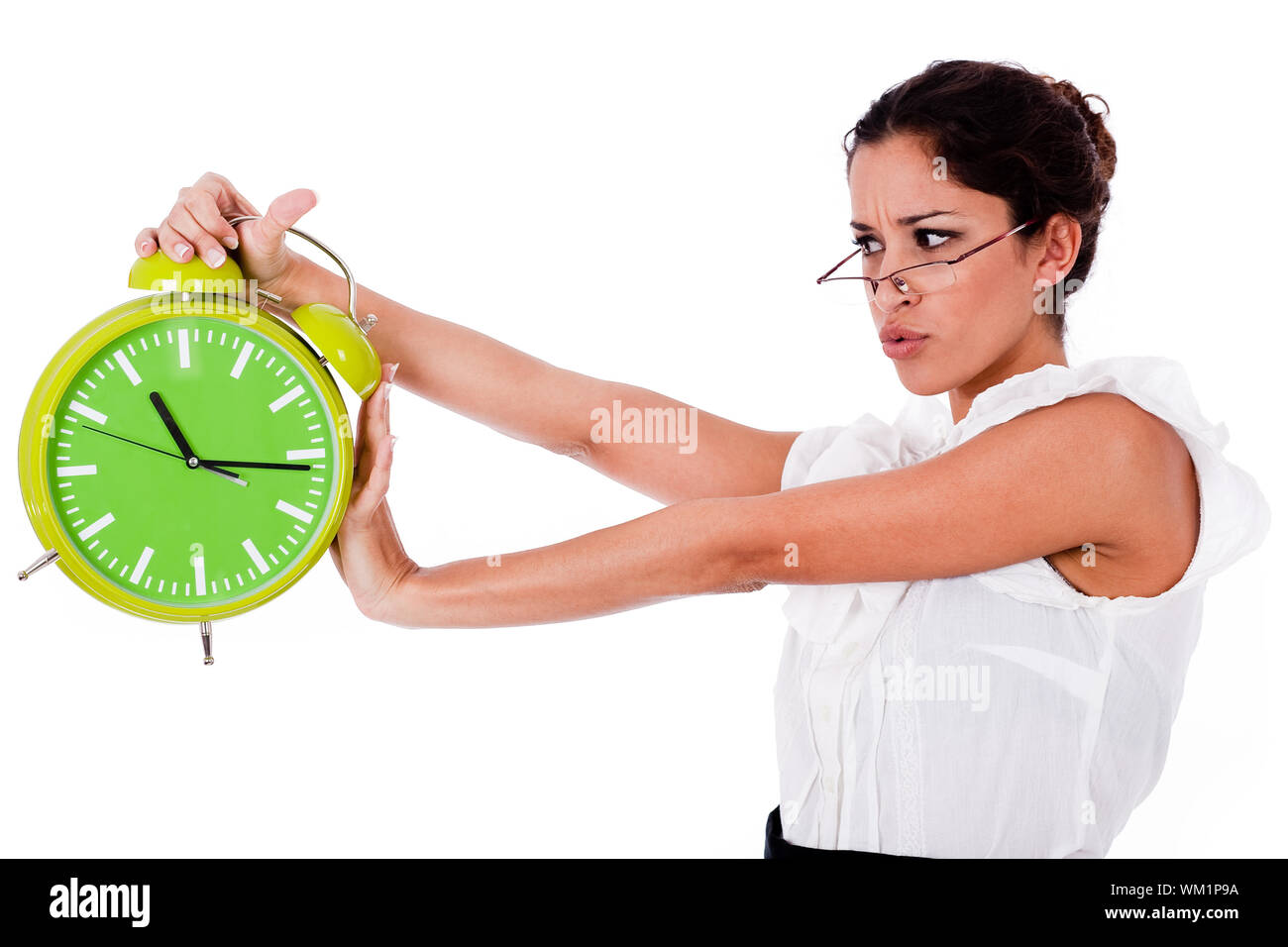 Schuss von eine junge Geschäftsfrau hält Uhr auf weißen Hintergrund isoliert Stockfoto