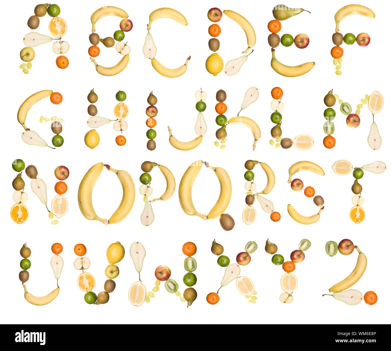 Verschiedene Früchte bilden das Alphabet auf weißem Hintergrund Stockfoto